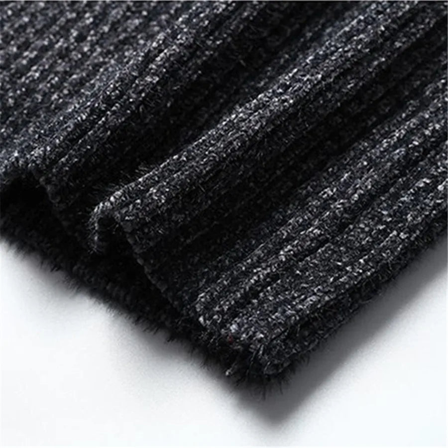 Close-up of black textured fabric on a white background