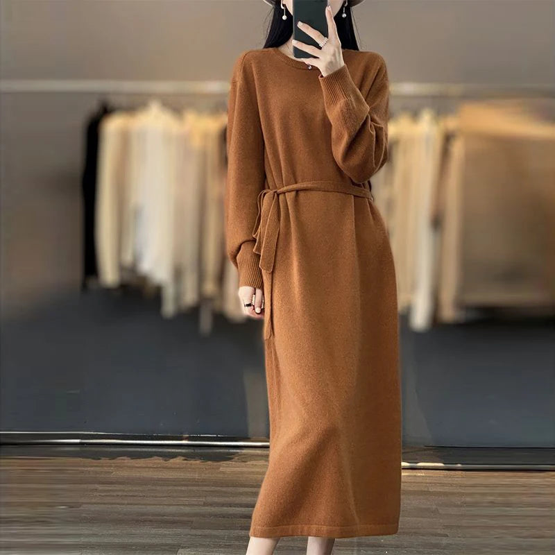Brown dress on a mannequin with a blurred clothing store background