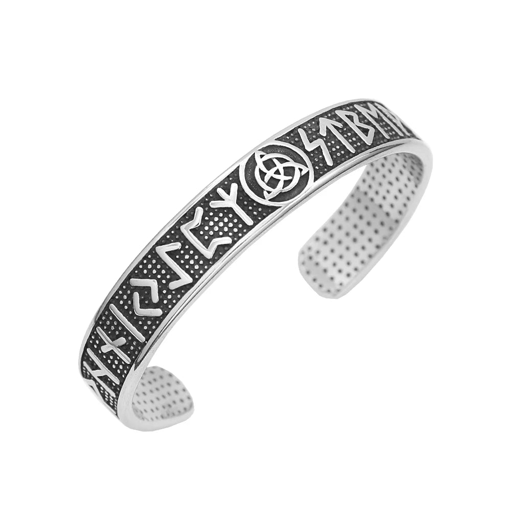 Silver bracelet with engraved symbols 
